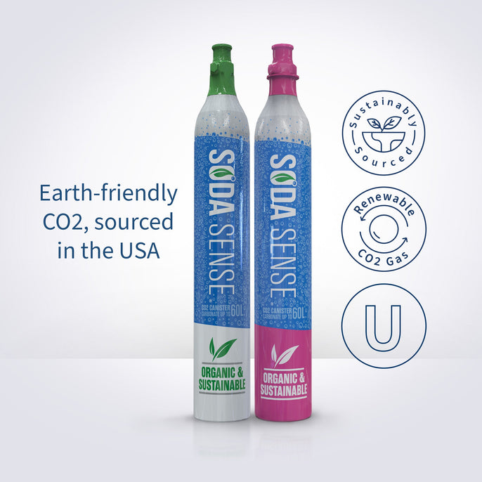 Two Soda Sense CO2 canisters, one with a green cap and the other with a pink cap, stand side by side. The text next to the canisters reads 'Earth-friendly CO2, sourced in the USA.' Icons beside the canisters highlight features such as USDA Organic, sustainably sourced, and renewable CO2 gas